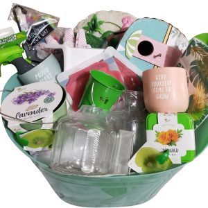 Curated gardening gift basket featuring tools, seeds, and birdhouse for gardeners.
