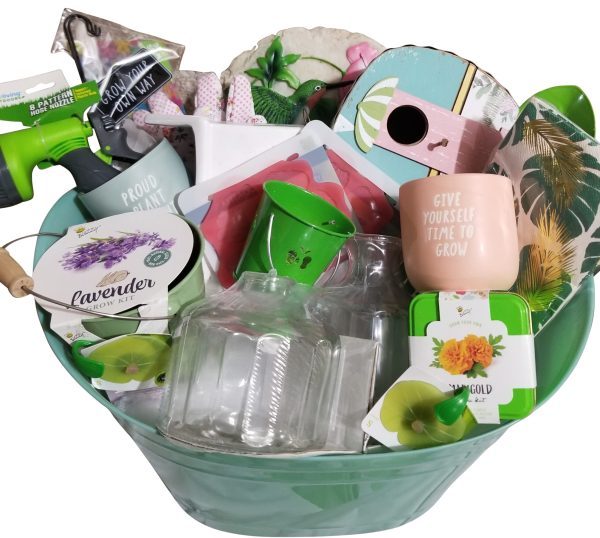 Curated gardening gift basket featuring tools, seeds, and birdhouse for gardeners.