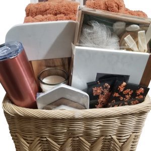 Luxury housewarming gift basket with fleece throw and cutting board