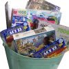 A curated family puzzle night gift box with games and snacks for a family night in.