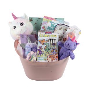 Unicorn gift basket for girls featuring a unicorn plush toy and colorful accessories.