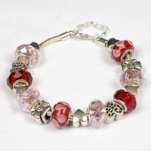 Handmade Valentine's Day wish bracelet with red and pink glass beads and heart spacers