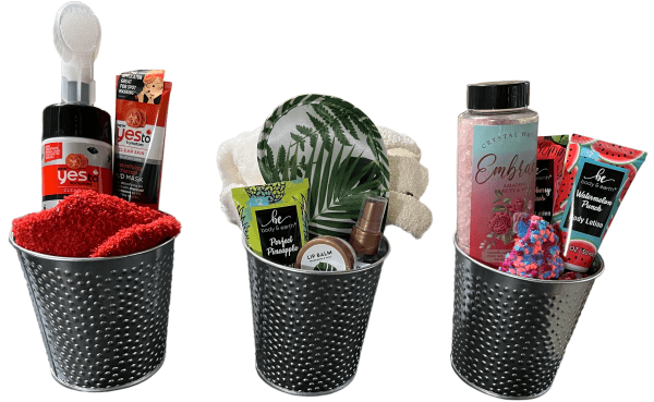 Small Self-Care Spa Gift Basket for Women with bath and body products in a metal tin.