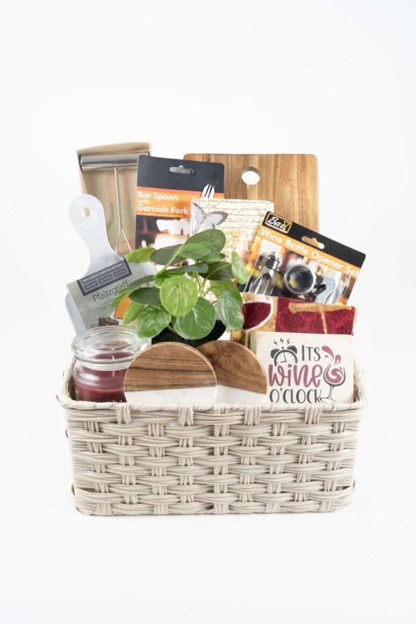 Personalized housewarming gift basket featuring custom laser engraved wooden cutting board and coasters