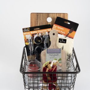 Personalized metal wire wine lover gift basket with custom engraved wood cutting board and two stemless wine glasses.