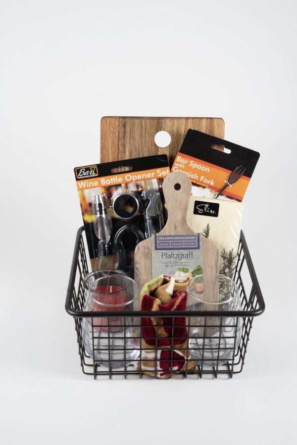 Personalized metal wire wine lover gift basket with custom engraved wood cutting board and two stemless wine glasses.