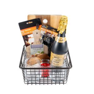 Personalized housewarming gift basket with two custom engraved wood coasters for a realtor closing gift.