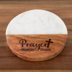 Inspirational christian drink coasters made of white marble and wood engraved with Prayer Changes Things.