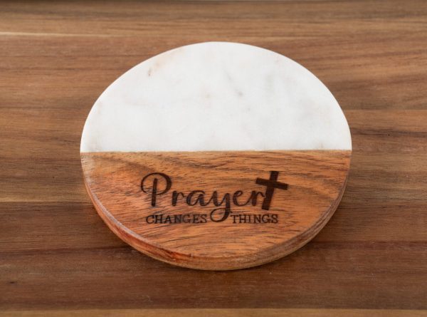 Inspirational christian drink coasters made of white marble and wood engraved with Prayer Changes Things.