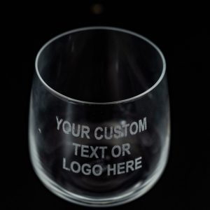 Custom laser etched rocks glasses with corporate logo for business gifts.