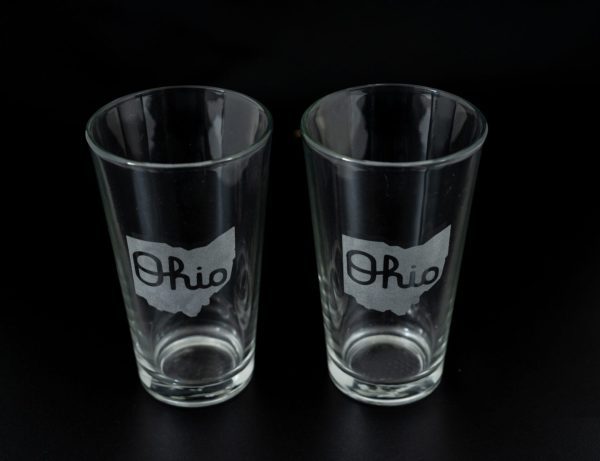 Pair of 16oz pint glasses laser etched with State of Ohio and Script Ohio design.