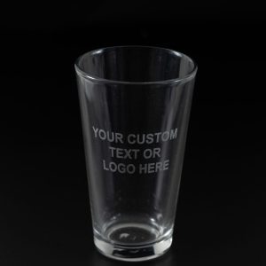 Pair of personalized custom pint glasses with custom monogram etching for beer lovers.