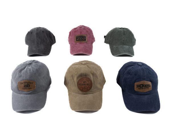 Personalized leather patch hat with custom laser engraving on distressed vintage cap