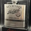 Personalized silver retirement flask with custom name and date engraving.