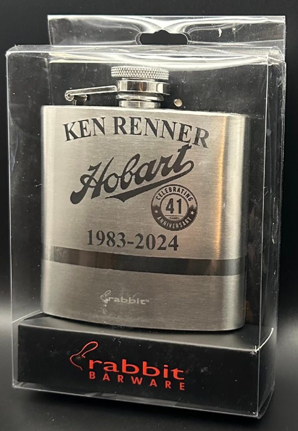 Personalized silver retirement flask with custom name and date engraving.