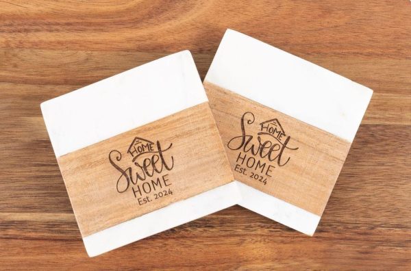 Pair of square marble and wood coasters engraved with Home Sweet Home for realtor closing gifts.