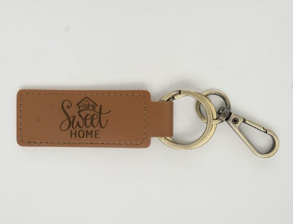 Laser engraved Home Sweet Home key chain used as a realtor housewarming closing gift.
