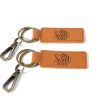 Set of 2 personalized housewarming gift key chains from Ohio Basket Chic, ideal as a realtor closing gift.