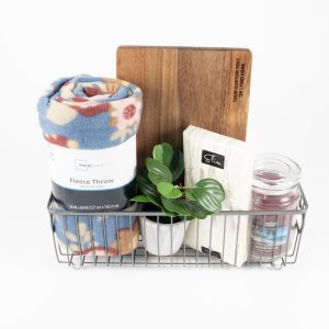 Ohio Basket Chic housewarming gift basket with custom wood cutting board fleece blanket and decorative plant