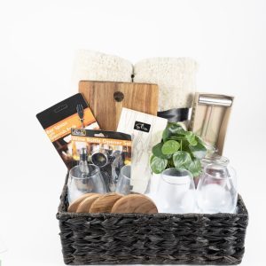 Personalized housewarming gift basket with custom laser engraved cutting board glasses and coasters by Ohio Basket Chic