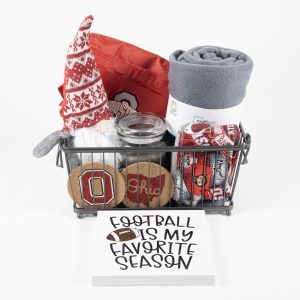 Medium Ohio State Buckeye gift basket inside a metal wire caddy containing a fleece blanket, fan gnome, and custom coasters.