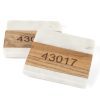 Personalized marble and wood square coasters engraved with custom zip code