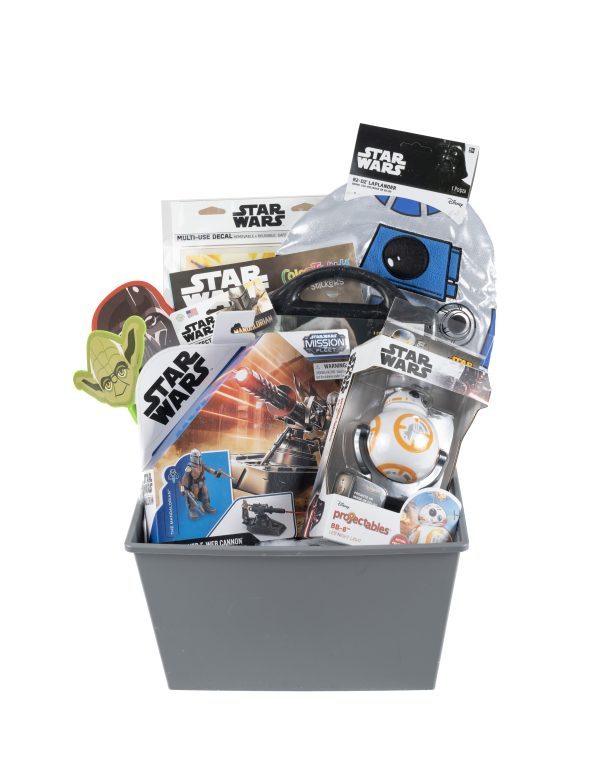 Star Wars gift basket for kids featuring a Laplander hat activity book and light projector toy