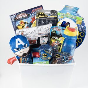 Marvel and DC superhero gift basket for kids featuring plush toys and puzzles