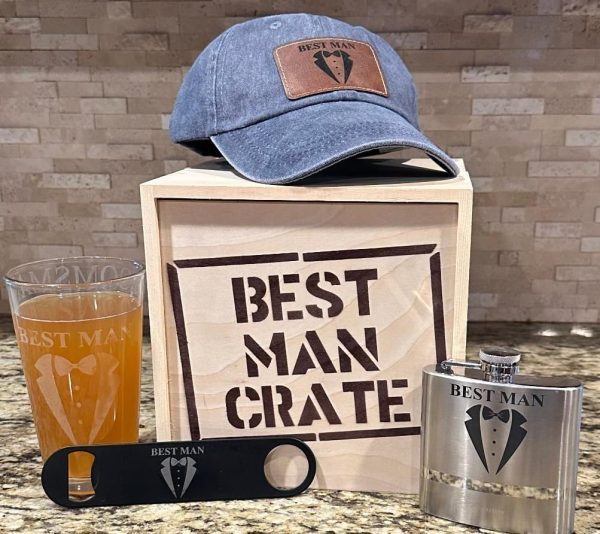 Best Man Gift Set inside a stenciled birch wood crate featuring a blue distressed hat flask pint glass and bottle opener.