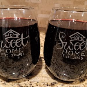 Pair of etched 19oz stemless wine glasses with Home Sweet Home design for housewarming gift.