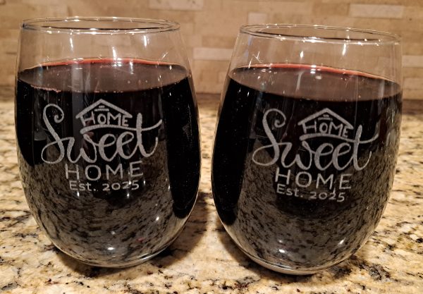 Pair of etched 19oz stemless wine glasses with Home Sweet Home design for housewarming gift.