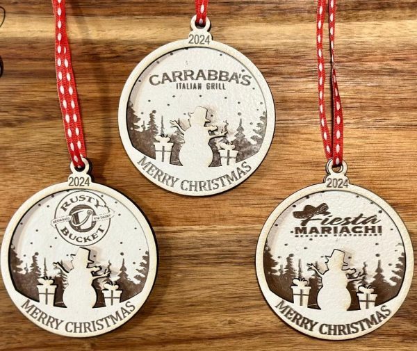 Personalized corporate Christmas ornaments featuring a white painted 2D truck shape with custom laser engraved business logo.