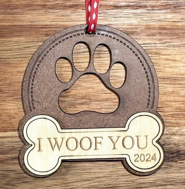 Personalized dog Christmas ornament handcrafted from natural birch wood with bone ribbon.