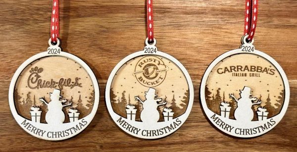 Custom corporate logo christmas ornaments made of white paint and natural birch wood by Ohio Basket Chic.