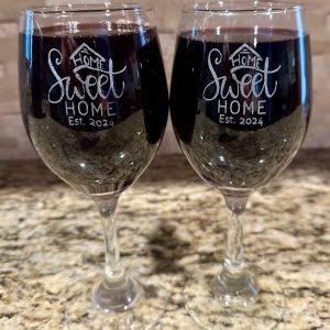 Pair of personalized Home Sweet Home etched wine glasses for housewarming gift.