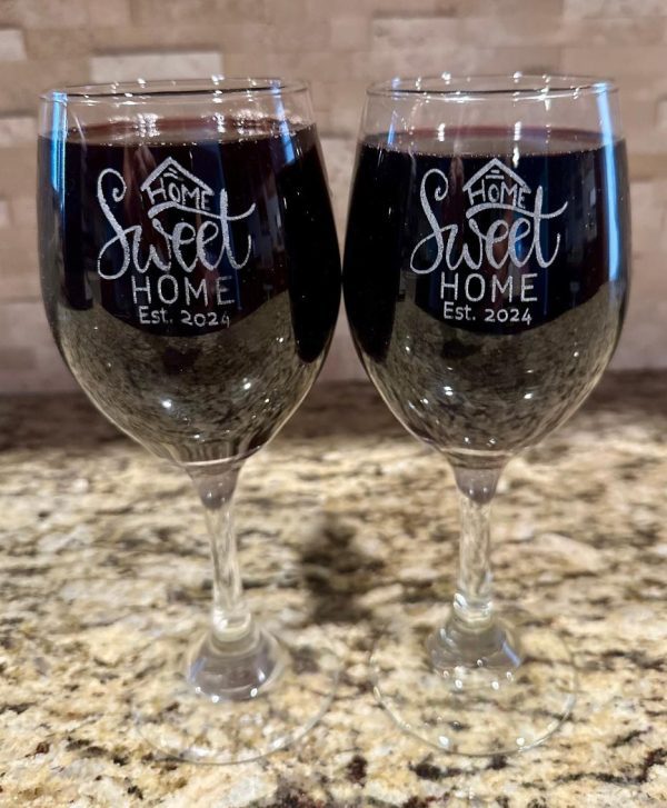 Pair of personalized Home Sweet Home etched wine glasses for housewarming gift.