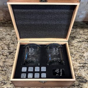 Personalized Bourbon Gift Set with engraved glasses and whiskey stones in a wooden box.