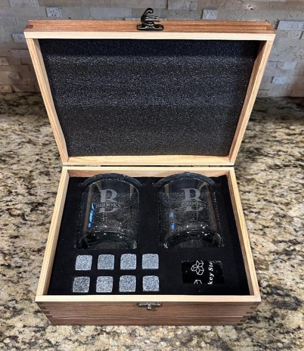 Personalized Bourbon Gift Set with engraved glasses and whiskey stones in a wooden box.
