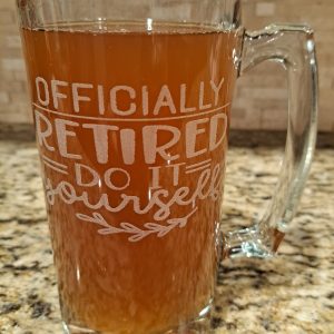 Etched glass retirement mug with Officially Retired Do It Yourself funny design