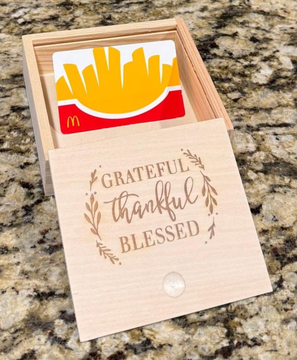 Custom logo engraved wooden boxes used as corporate appreciation gifts for employees and VIPs.
