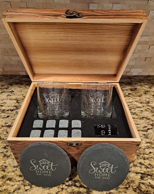Personalized Home Sweet Home bourbon gift set with engraved glasses and whiskey stones in a wood box.