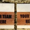 Personalized marble and wood coasters engraved with custom sports team logo.