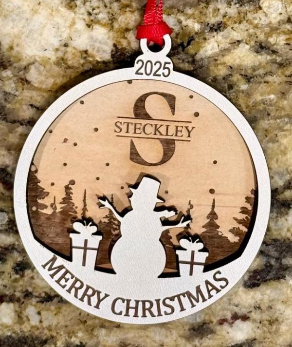 Handcrafted wooden personalized family name ornament laser engraved for a custom anniversary or housewarming gift