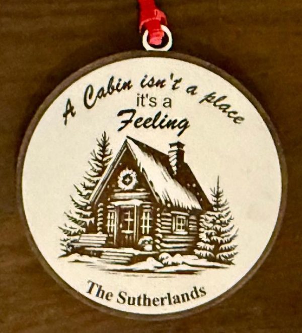 Handcrafted Ohio Basket Chic personalized cabin Christmas ornament made of white birch wood engraved with a family name.