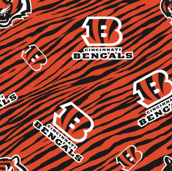 Personalized wooden Cincinnati Bengals ornament hanging on a tree as a custom football gift.