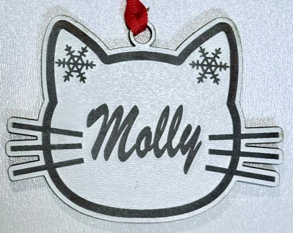 Handcrafted laser engraved wood personalized cat name ornament featuring a custom engraved name