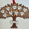 Ohio Basket Chic personalized corporate team ornament made of natural birch wood featuring multiple employee names engraved on the tree branches.