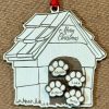 Personalized dog house ornament with custom engraved pet names on wooden paws by Ohio Basket Chic.