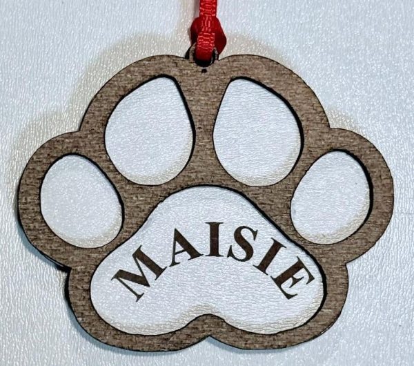 Personalized pet paw ornament custom engraved with pet name for Christmas tree decoration.